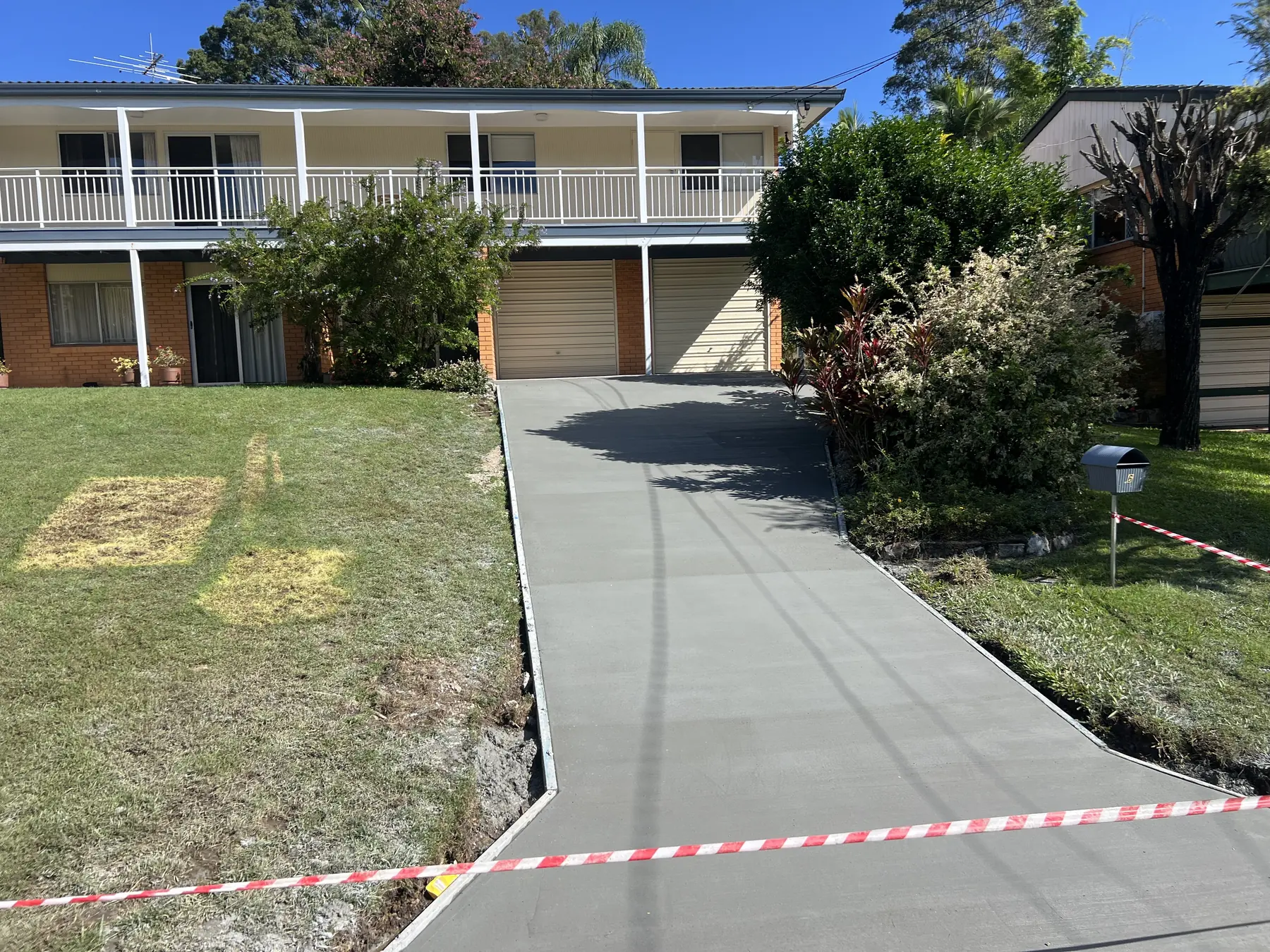 After: Dirt track to a driveway you can push a pram up