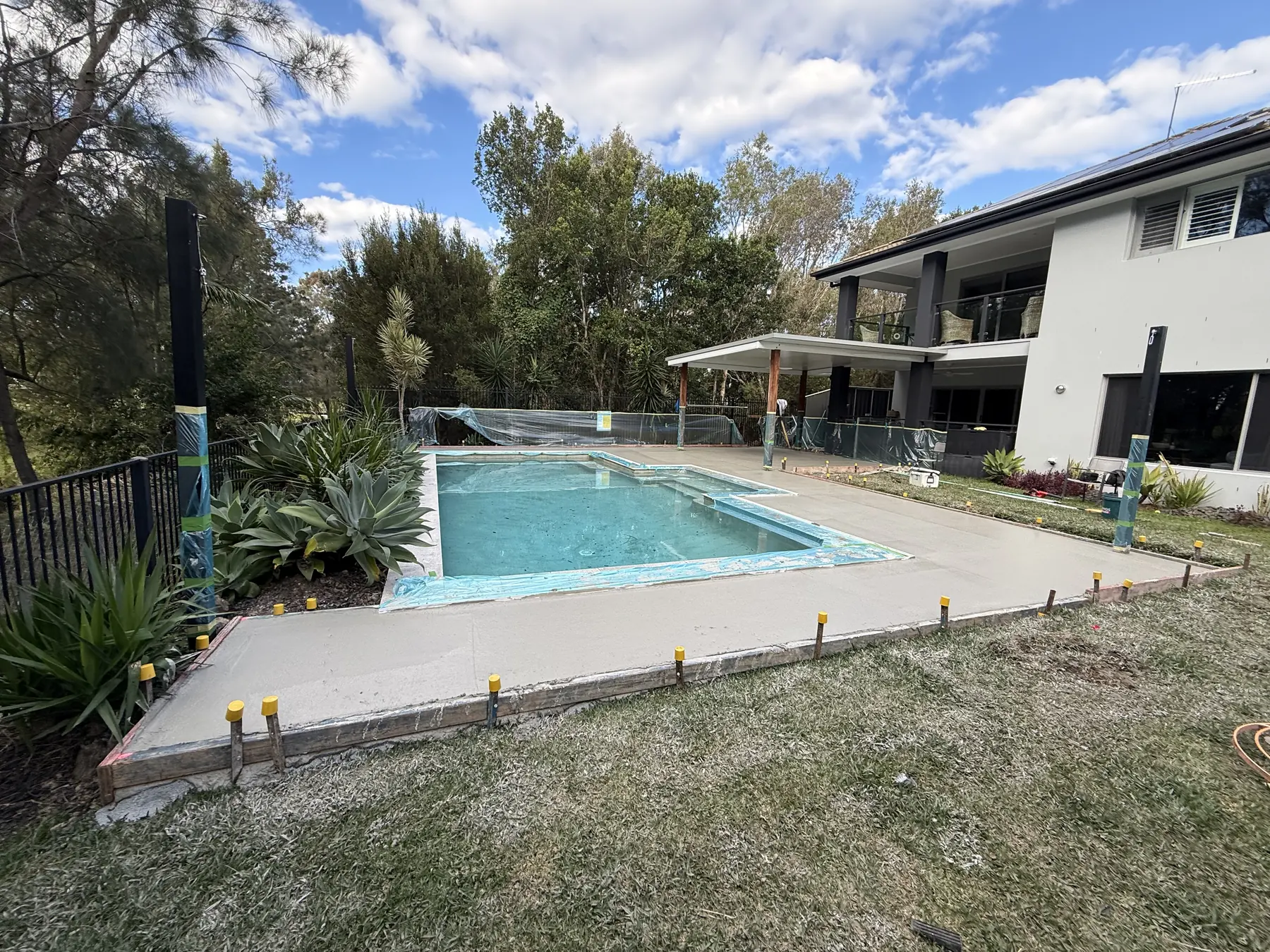 A pool surrounds job by Bunce Concrete